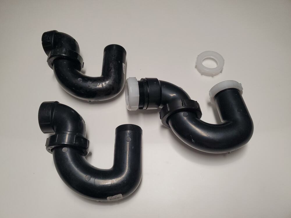 Lot of P-Traps Assorted Tubes and Pieces Plumbing Drain Parts Mixed Set